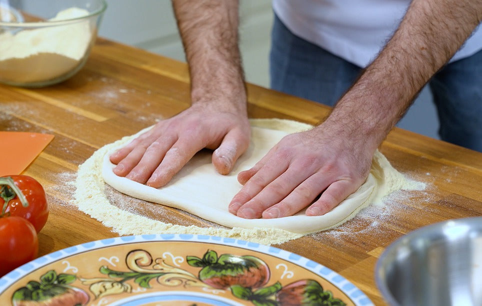 How to Stretch Perfect Pizza Dough Every Time